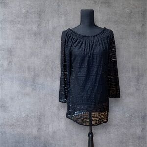 Kenneth Cole Reaction black, off-the-shoulder, sheer, long-sleeved blouse.